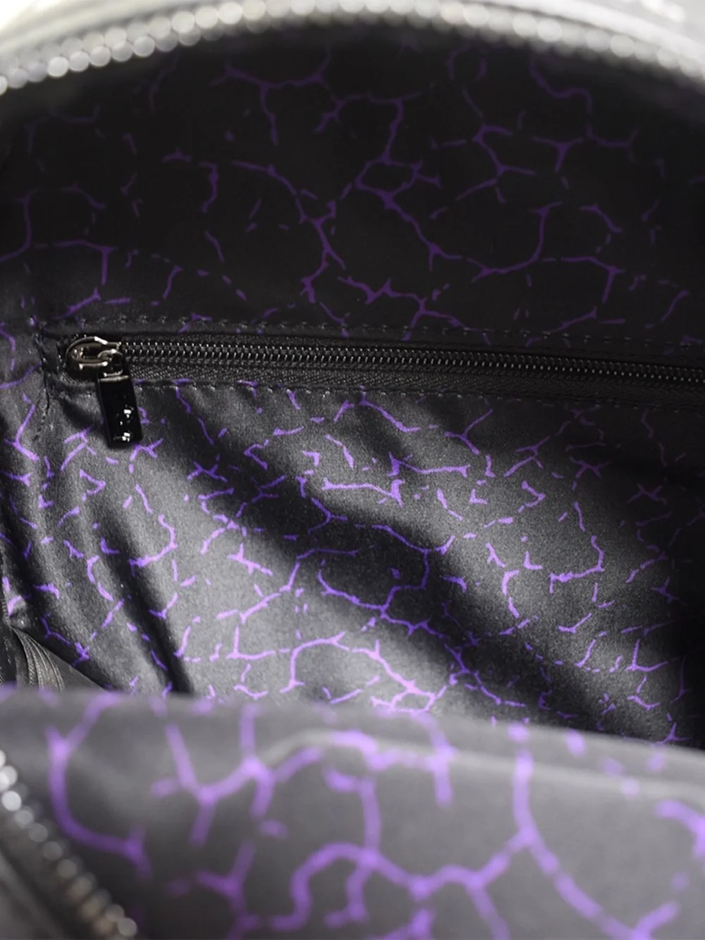 Loungefly Black & White Howl-O-Scream Skeleton Hand Mini Backpack